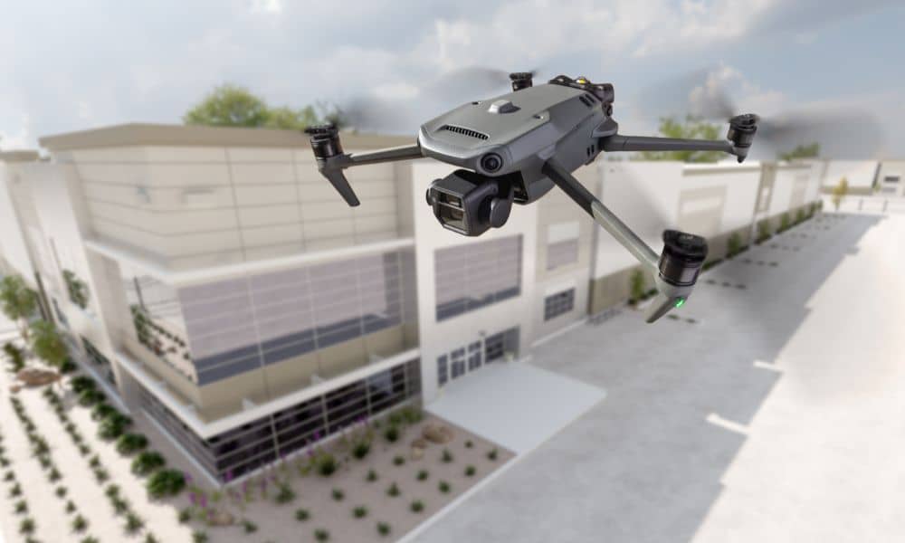 A drone surveying a modern development site, showing how new 3D tech supports clearer site data