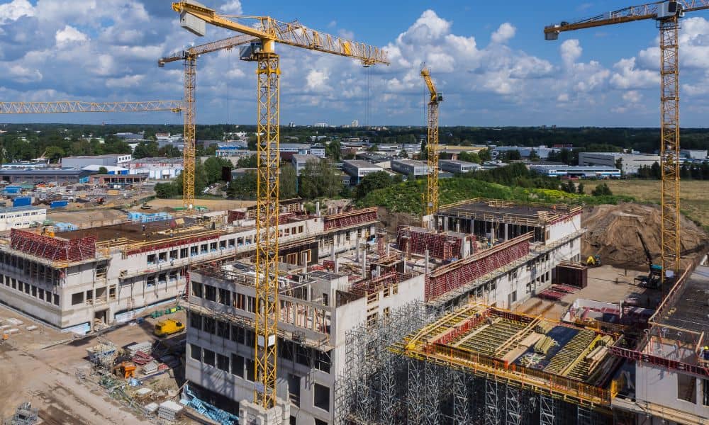 Large commercial construction site where construction surveyors help identify site risks early