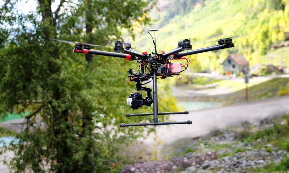 Aerial land mapping dron - ALTA SURVEY Georgia Drone surveyor capturing aerial data over land for surveying purposes