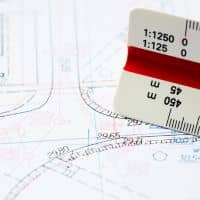 Land survey for fence placement illustrated through a property boundary map and survey scale