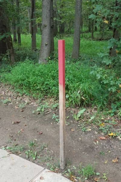 Property boundary marker used by surveyors near me during residential land survey work