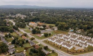 Aerial view of a neighborhood showing varied property layouts for a lot survey